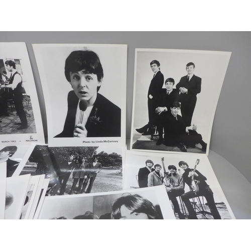 641 - A collection of thirteen original Beatles EMI promotional photographs