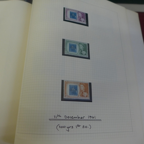 663 - A Stanley Gibbons The Plymouth Album with world Mint stamps, a Simplex blank album and two stamp boo... 