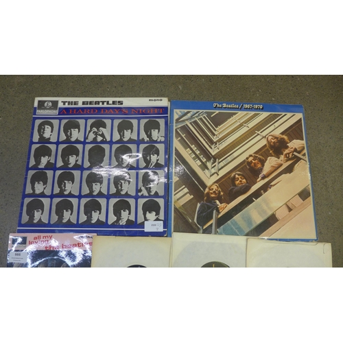 666 - The Beatles, two LPs and twelve 45rpm singles