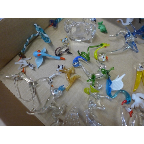 672 - A collection of glass animal figures, approximately fifty in total