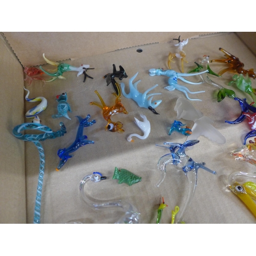 672 - A collection of glass animal figures, approximately fifty in total