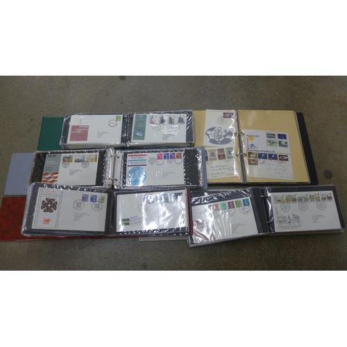 707 - A box of Royal Mail First Day Covers in four albums and a part album of postal history