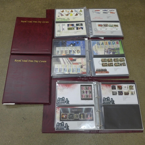 717 - Three albums of Royal Mail First Day Covers and two albums, blank with inserts