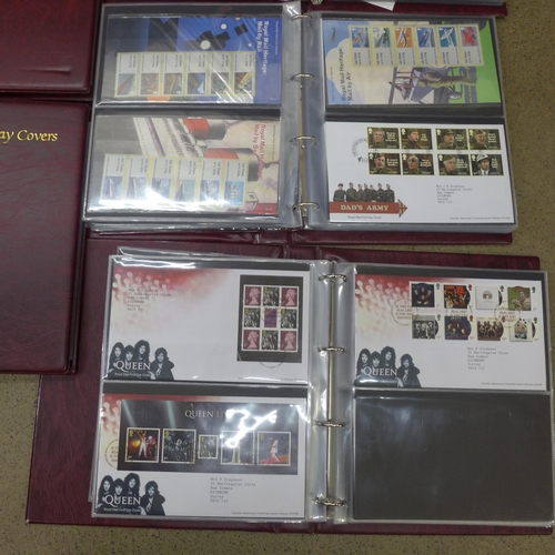 717 - Three albums of Royal Mail First Day Covers and two albums, blank with inserts