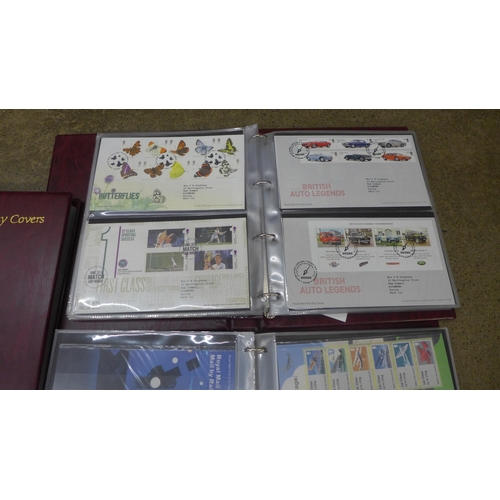 717 - Three albums of Royal Mail First Day Covers and two albums, blank with inserts