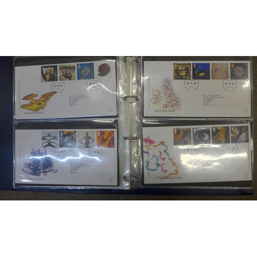 738 - An album of postcards, Twinings 'Stamps' and an album of First Day Covers and two albums of Royal Ma... 