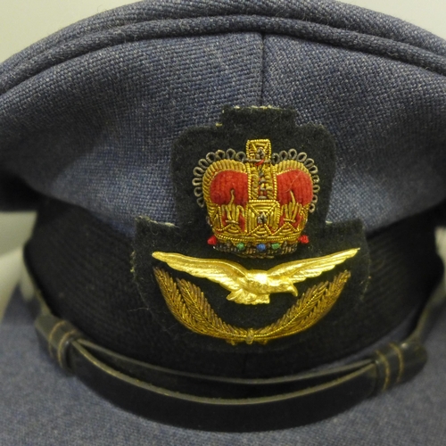 744 - A RAF peaked cap, one other and a mortar board