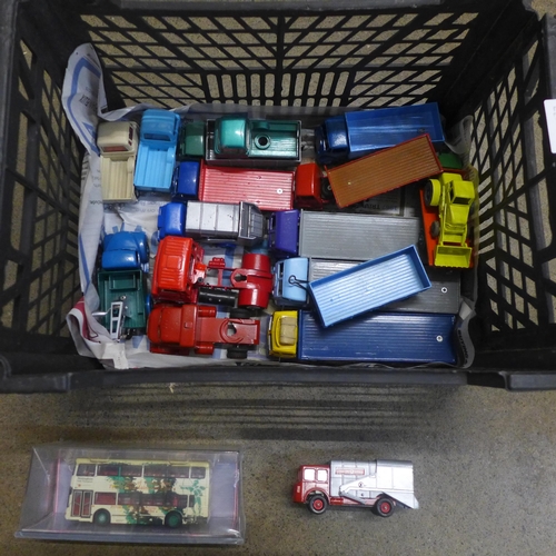 748 - Die-cast model vehicles including Dinky Supertoys lorries and flat-bed trucks, some re-painted