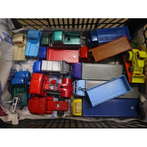 748 - Die-cast model vehicles including Dinky Supertoys lorries and flat-bed trucks, some re-painted