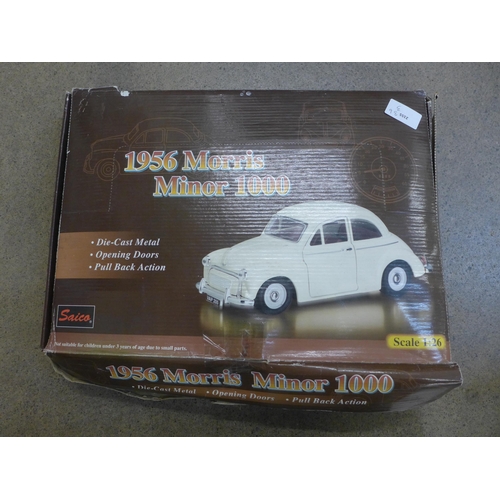 752 - Six Morris Minor model vans, associated box