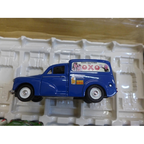 752 - Six Morris Minor model vans, associated box