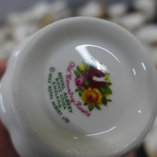 762 - A large collection of Royal Albert Old Country Roses, some seconds