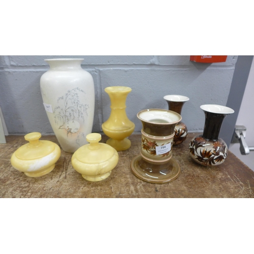 794 - A Poole Pottery Birds of Paradise vase, a yellow soapstone dressing table set and three pieces of Je... 