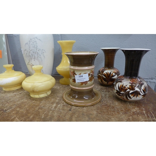 794 - A Poole Pottery Birds of Paradise vase, a yellow soapstone dressing table set and three pieces of Je... 