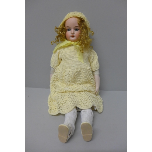 807 - A doll, marked 370, 48cm