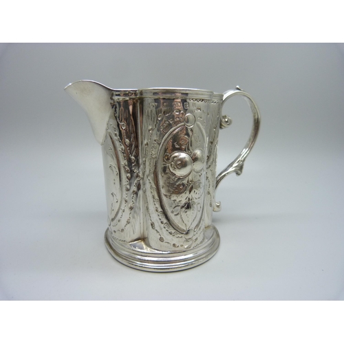 821 - An embossed silver jug, George Unite, Birmingham 1864, 99g, height 8cm