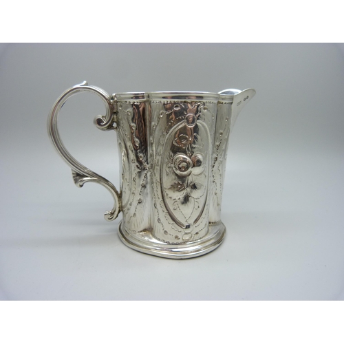 821 - An embossed silver jug, George Unite, Birmingham 1864, 99g, height 8cm