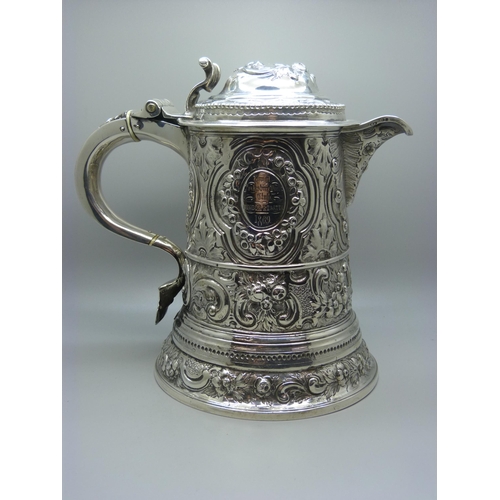 825 - A large George II silver tankard, London 1732, Thomas Mason, 1069g, later added spout with additiona... 