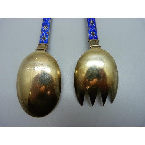 845 - A pair of silver gilt and enamel servers, Norway, J. Tostrup, 89g, 18cm