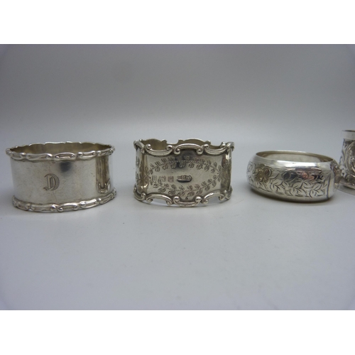 850 - Six silver napkin rings, two pairs and two singles, 118g