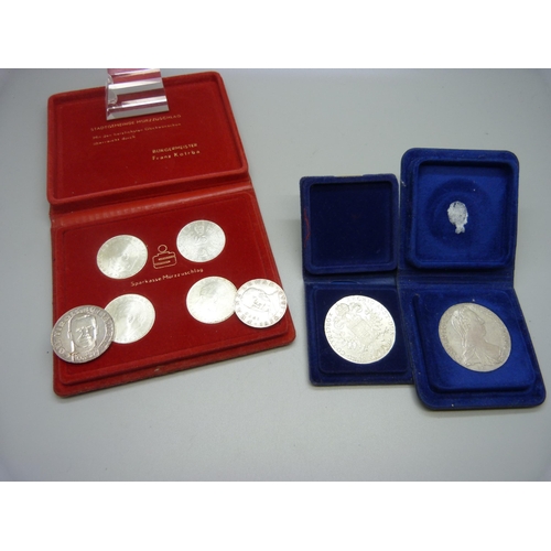 851 - Four Austrian silver proof coins, cased, two Maria Theresia silver coins and two others