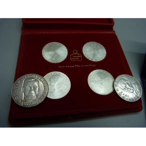 851 - Four Austrian silver proof coins, cased, two Maria Theresia silver coins and two others