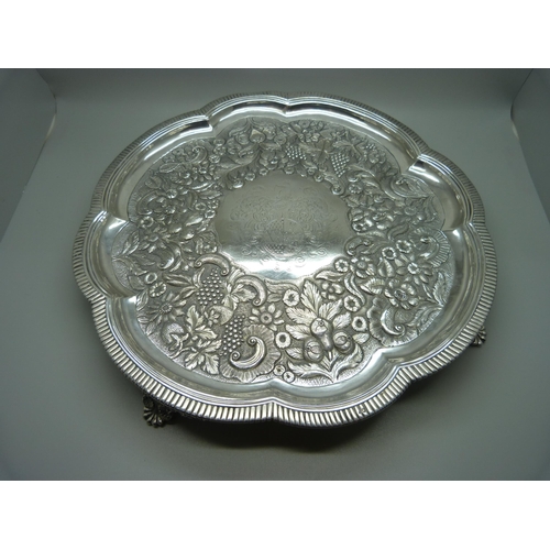 859 - An Irish silver salver, Dublin circa 1730, 1015g, partial marks, 32cm