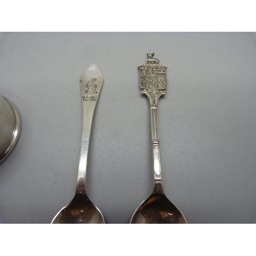 864 - Two silver spoons and a silver napkin ring, 40g