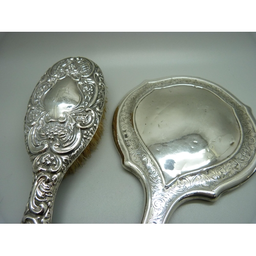 871 - Two silver mirrors and a brush