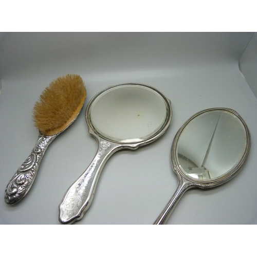 871 - Two silver mirrors and a brush