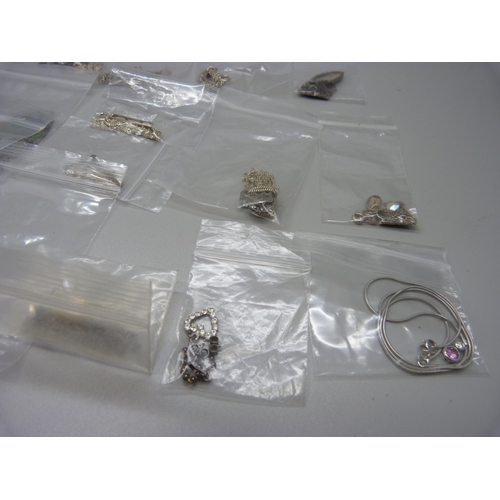 879 - Silver pendants and chains