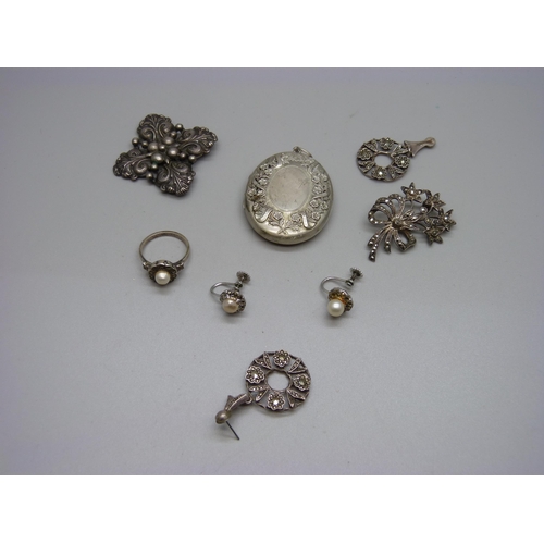 899 - A silver Candida brooch, a pair of silver and marcasite earrings (one pin missing), a silver and mar... 