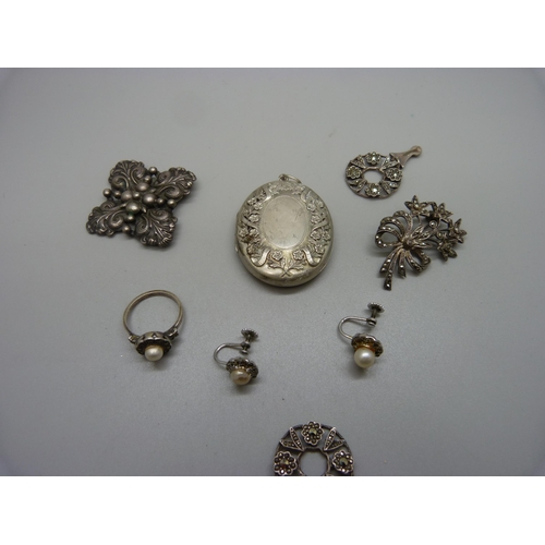 899 - A silver Candida brooch, a pair of silver and marcasite earrings (one pin missing), a silver and mar... 