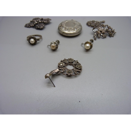 899 - A silver Candida brooch, a pair of silver and marcasite earrings (one pin missing), a silver and mar... 