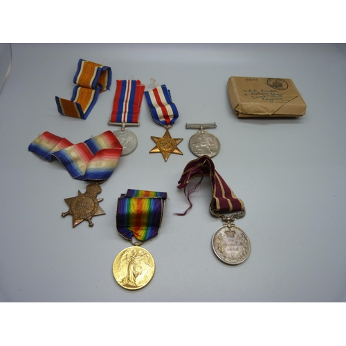 900 - A group of six medals, a George V For Meritorious Service Medal and a trio of WWI medals to 17982 A.... 