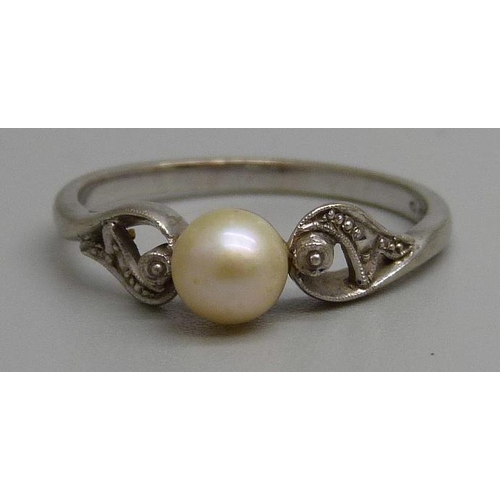 920 - A 9ct white gold and pearl ring, 2.4g, O