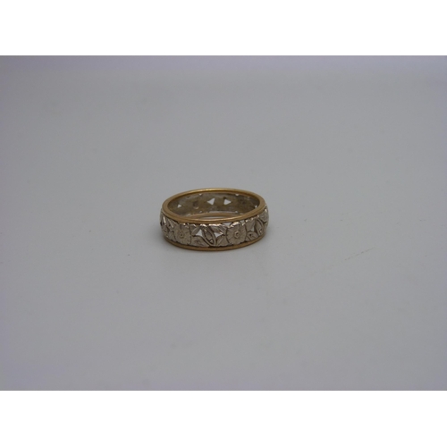 921 - A 9ct white and yellow gold eternity ring, 3.3g, N