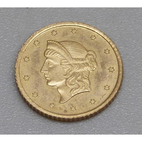 928 - An 1853 USA 1 Taler gold coin, 1.5g