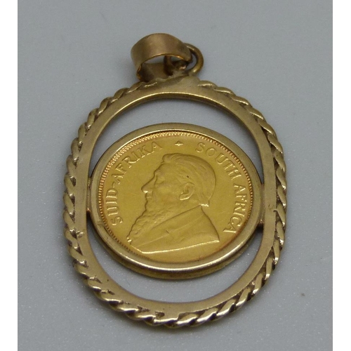 930 - A 1985 1/10th Krugerrand gold coin in a 9ct gold pendant mount, 5.7g