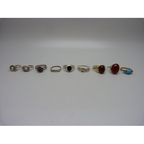 938 - Nine rings;- three 9ct gold and silver, three hallmarked silver, one white metal, one silver gilt an... 