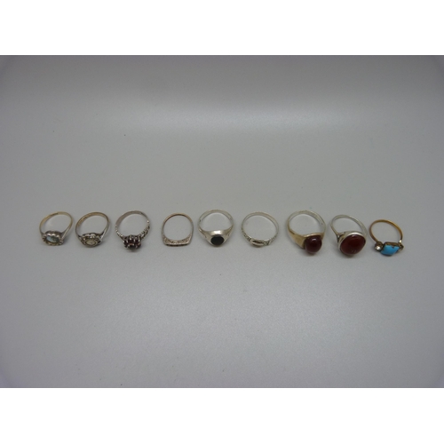 938 - Nine rings;- three 9ct gold and silver, three hallmarked silver, one white metal, one silver gilt an... 