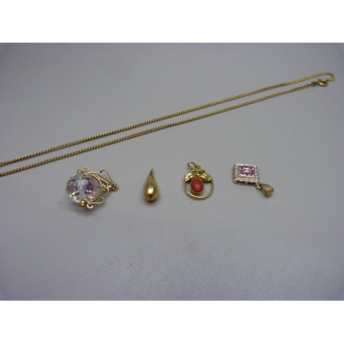 947 - A 9ct gold chain, 4.1g, and four 9ct gold pendants, 6.3g, (10.4g)