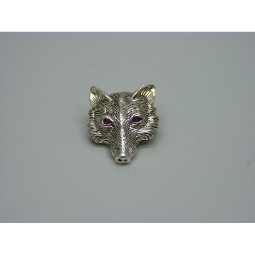 954 - A silver fox head brooch/pendant with ruby eyes