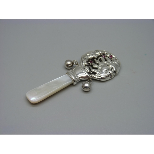 957 - A silver sun/moon rattle, a/f