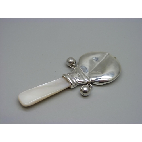 957 - A silver sun/moon rattle, a/f