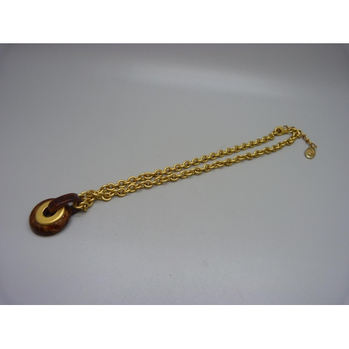 975 - An Italian designer pendant and chain