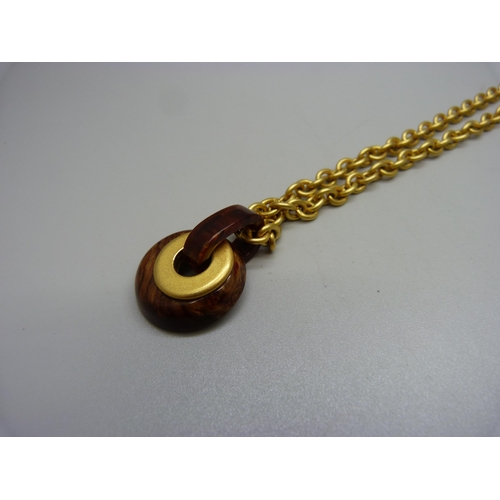 975 - An Italian designer pendant and chain