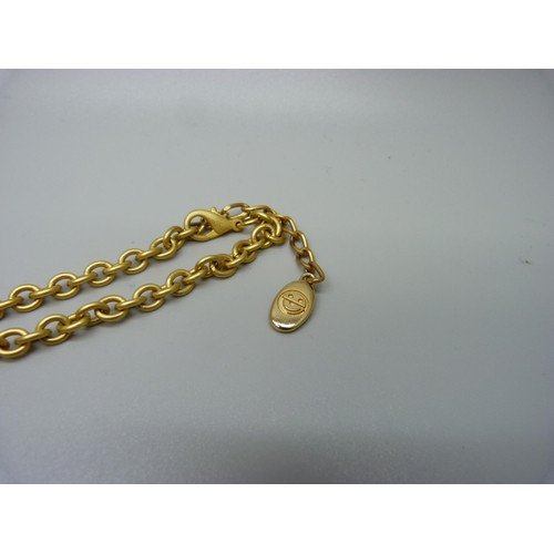 975 - An Italian designer pendant and chain