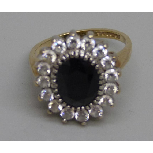 976 - A 9ct gold, sapphire and white stone cluster ring, 5g, L