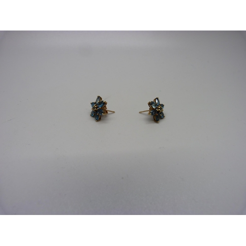 994 - A pair of 9ct gold and mystic topaz earrings and a pair of Celtic style 9ct gold earrings with diamo... 